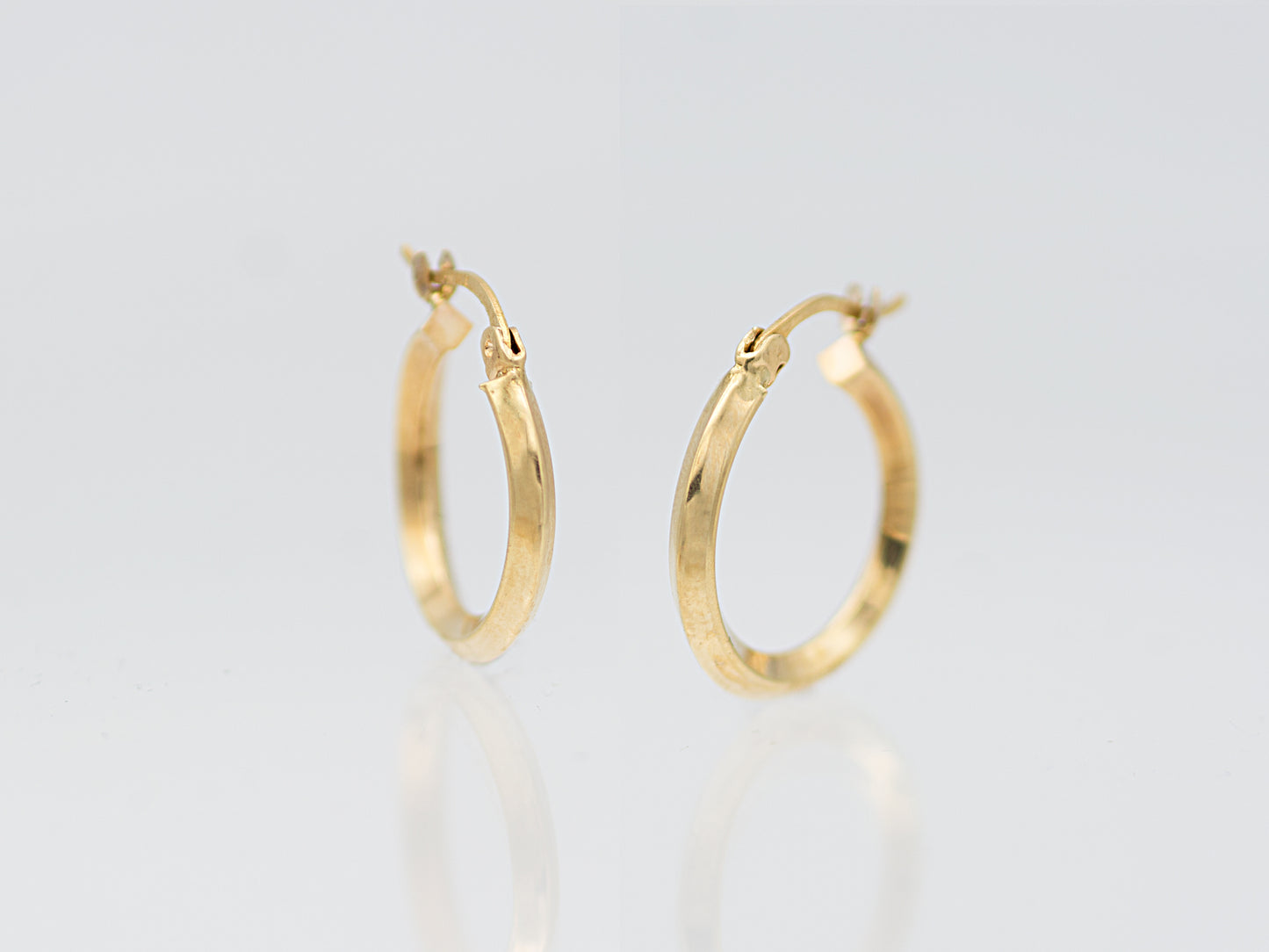 Knife Edge Hoop Earrings In 14K Yellow Gold tube huggie