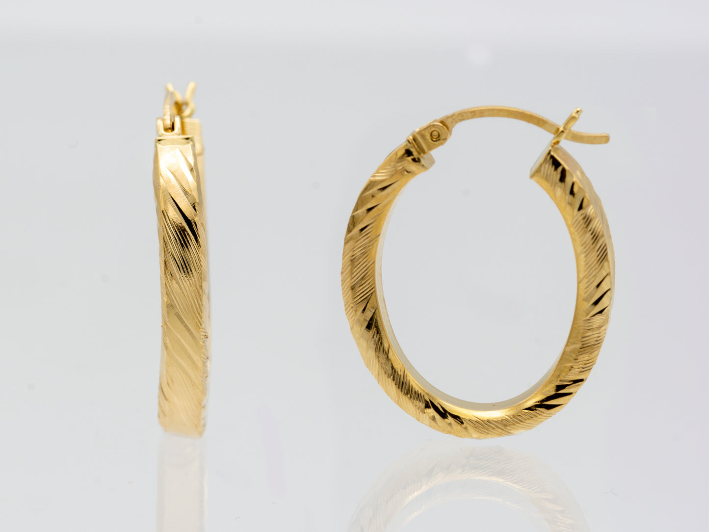 14K Solid Gold Hollow Textured Oval Hoops earrings