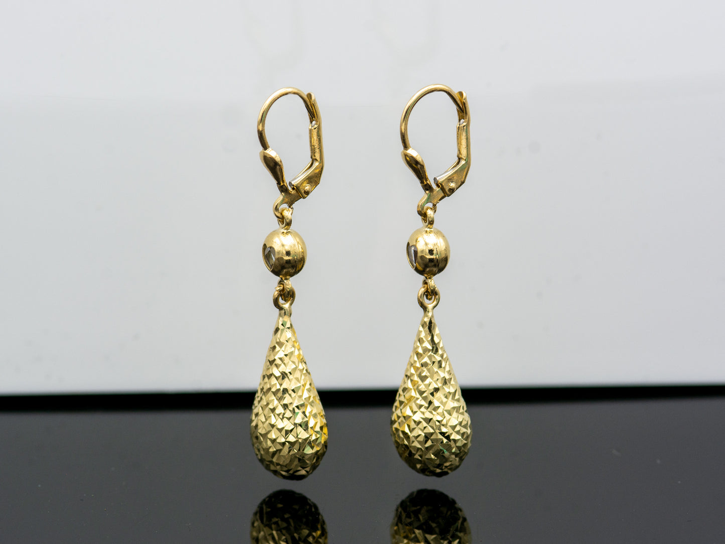 14k solid gold Diamond-Cut Puff Teardrop Dangle Earrings in Hollow