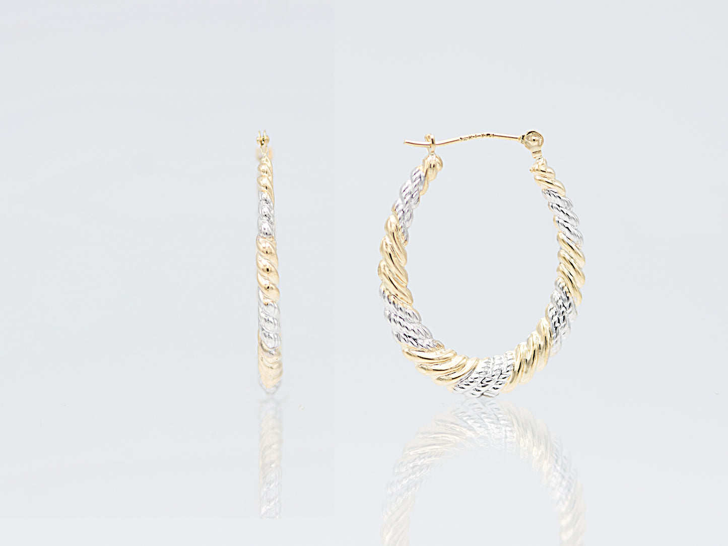 Oval twisted two tone hoop