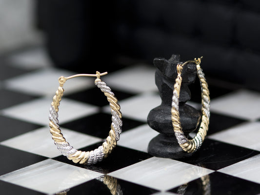 Oval twisted two tone hoop