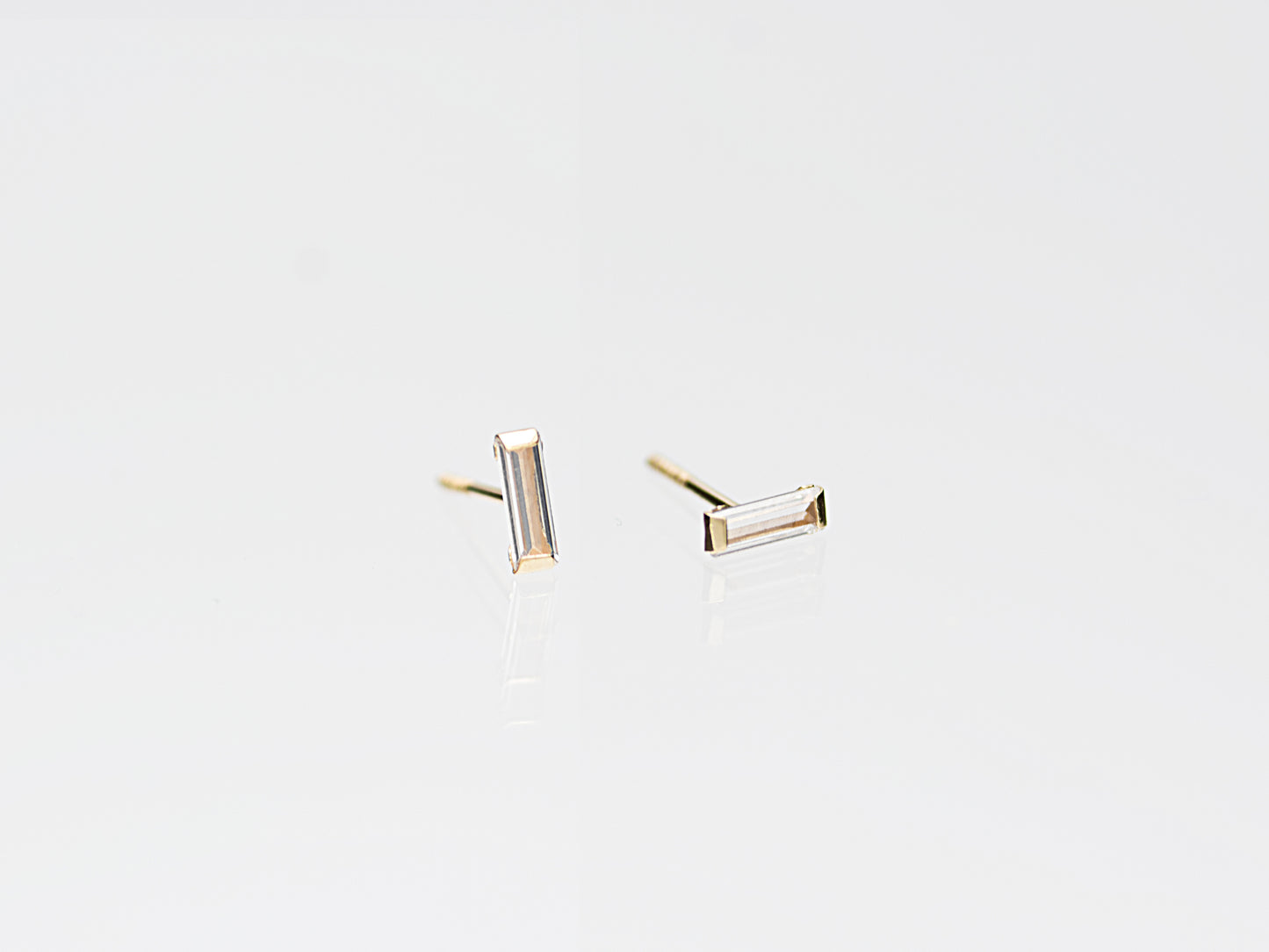 14k Solid gold emerald cut simulated diamond studs earrings