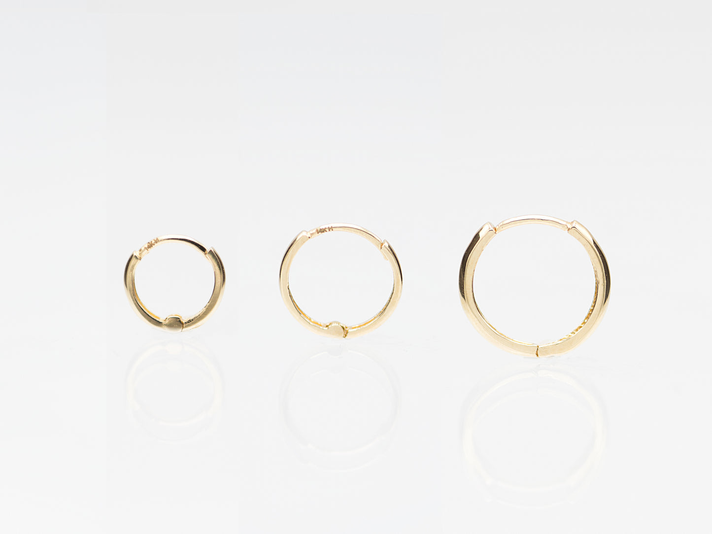 14k Yellow gold mini hoop earrings